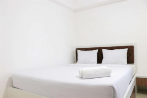 Minimalist and Warm 1BR at Bassura City Apartment By Travelio